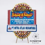 Karangan bunga papan selamat dan sukses warna biru
